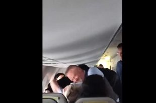 Flight Attendant on Alaskan Airlines Throat Punches Psychotic Passenger Who Won’t Let Go of Womans Hair.